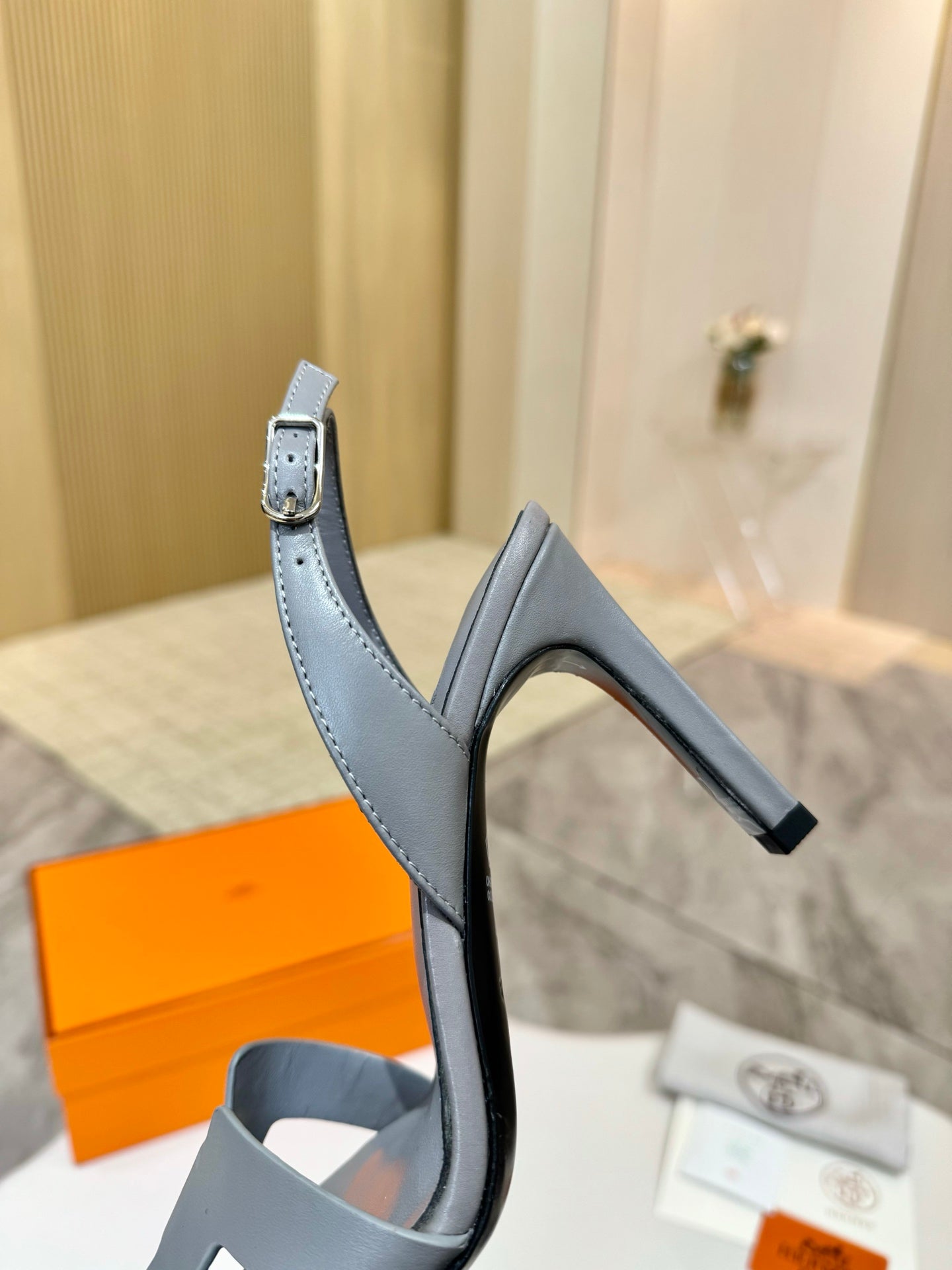 Light blue-gray leather heeled sandal with T-strap and ankle strap