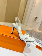 White leather heeled sandal with ankle strap and open toe, stiletto heel