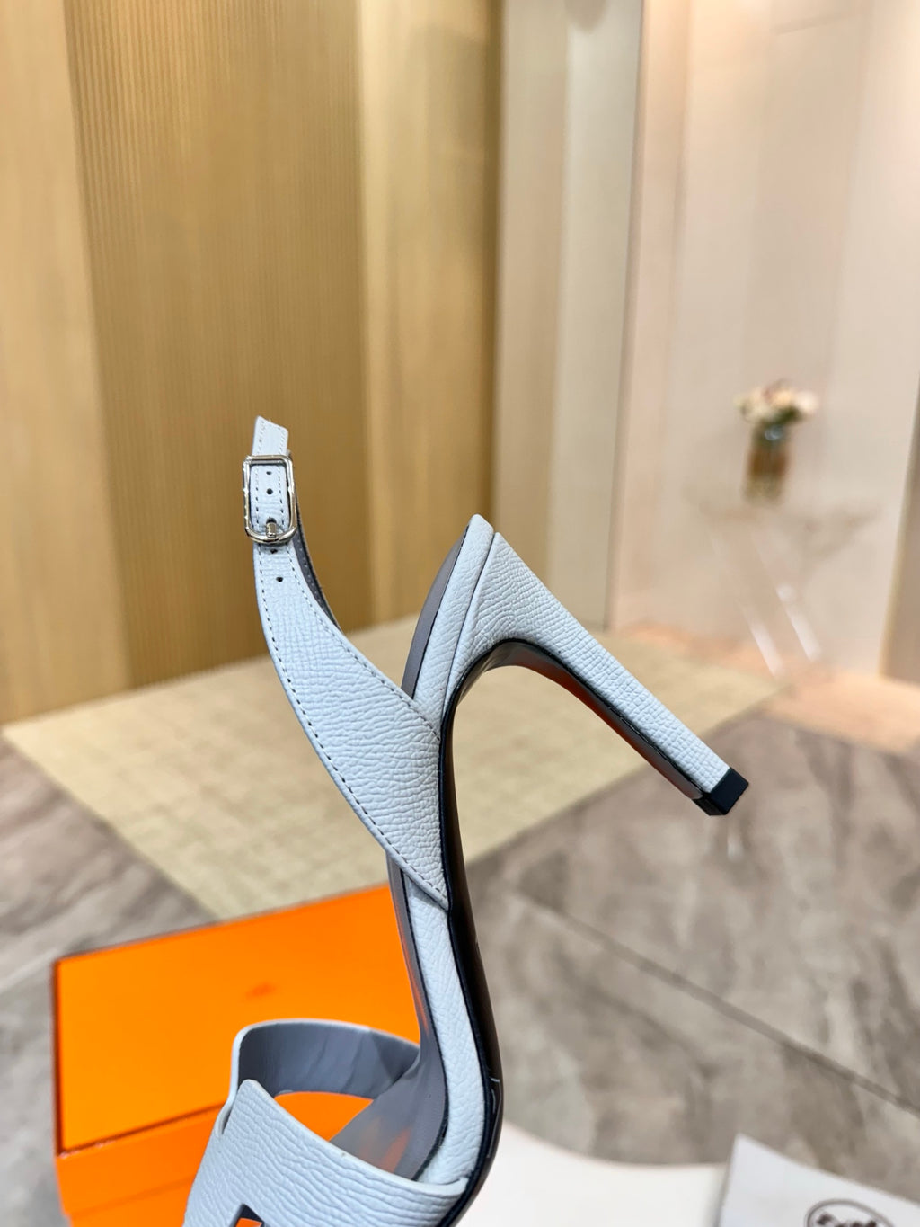 Hermes ladies heeled sandals profile view, light blue with thin ankle strap