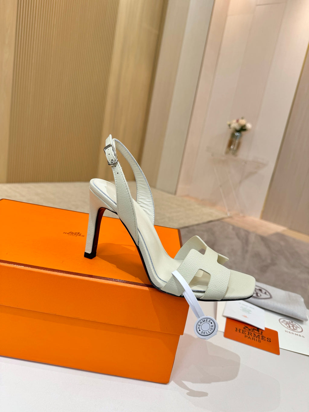 Hermes ladies heeled sandals in light cream leather, ankle strap, slim black heel