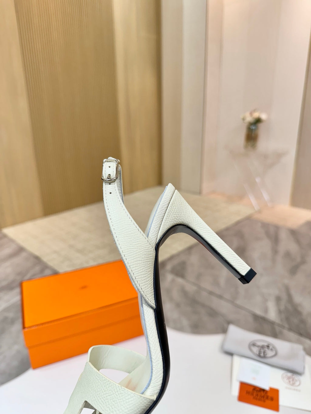 Hermes ladies heeled sandals in light cream leather, ankle strap, glossy black heel