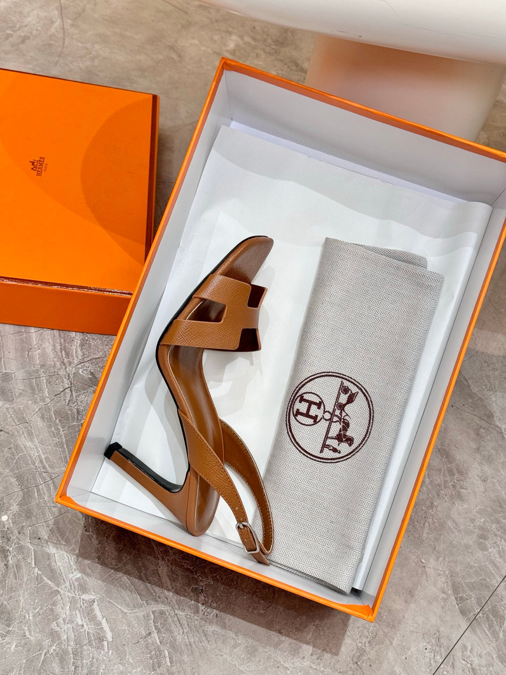 Brown leather heeled sandals in gift box, featuring openwork straps and ankle strap