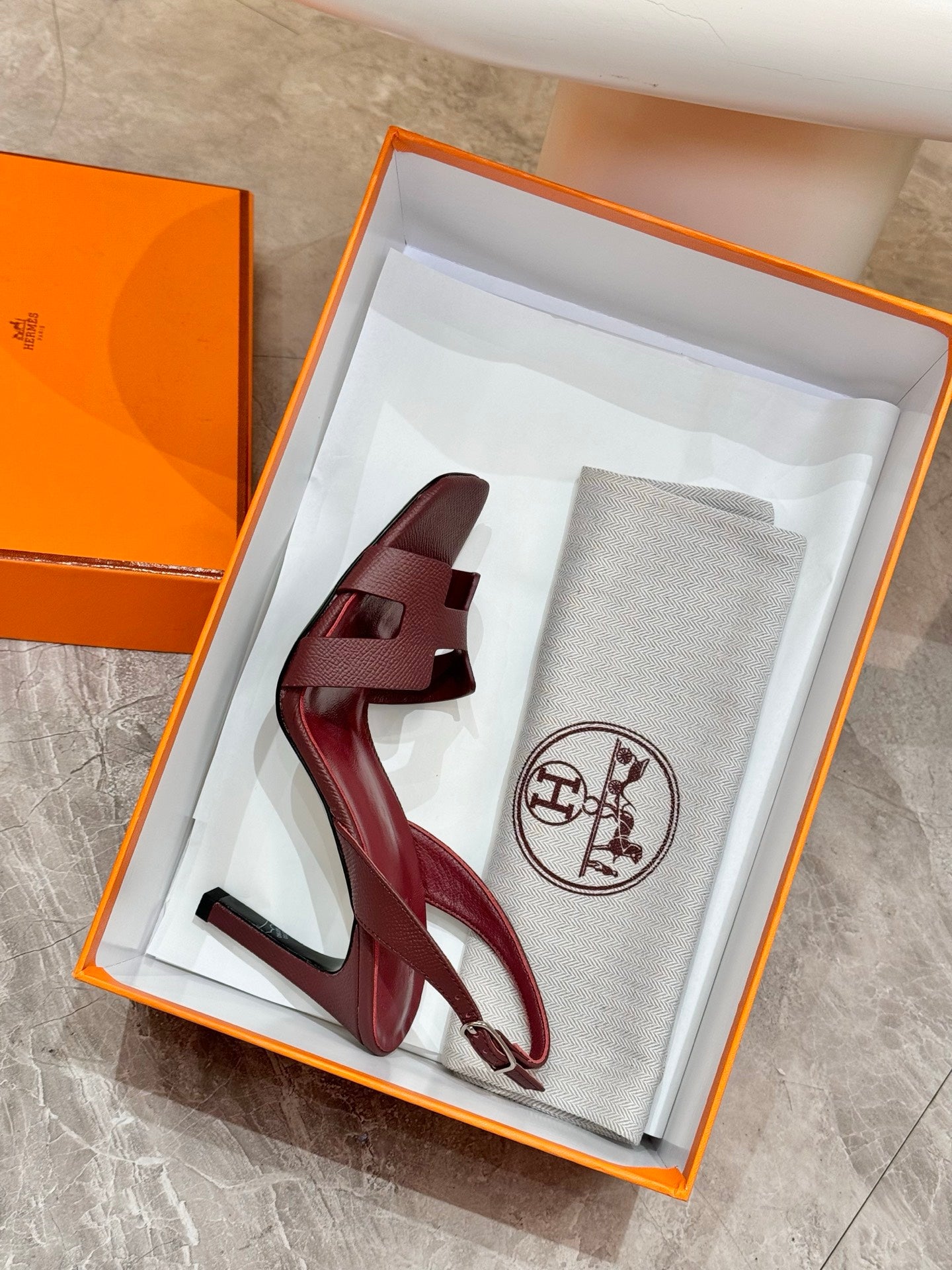 Hermes ladies' leather heeled sandals in dark burgundy, T-strap ankle buckle, in box.