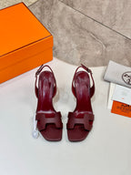 Hermes ladies' leather heeled sandals in dark burgundy, open toe T-strap, pair view.