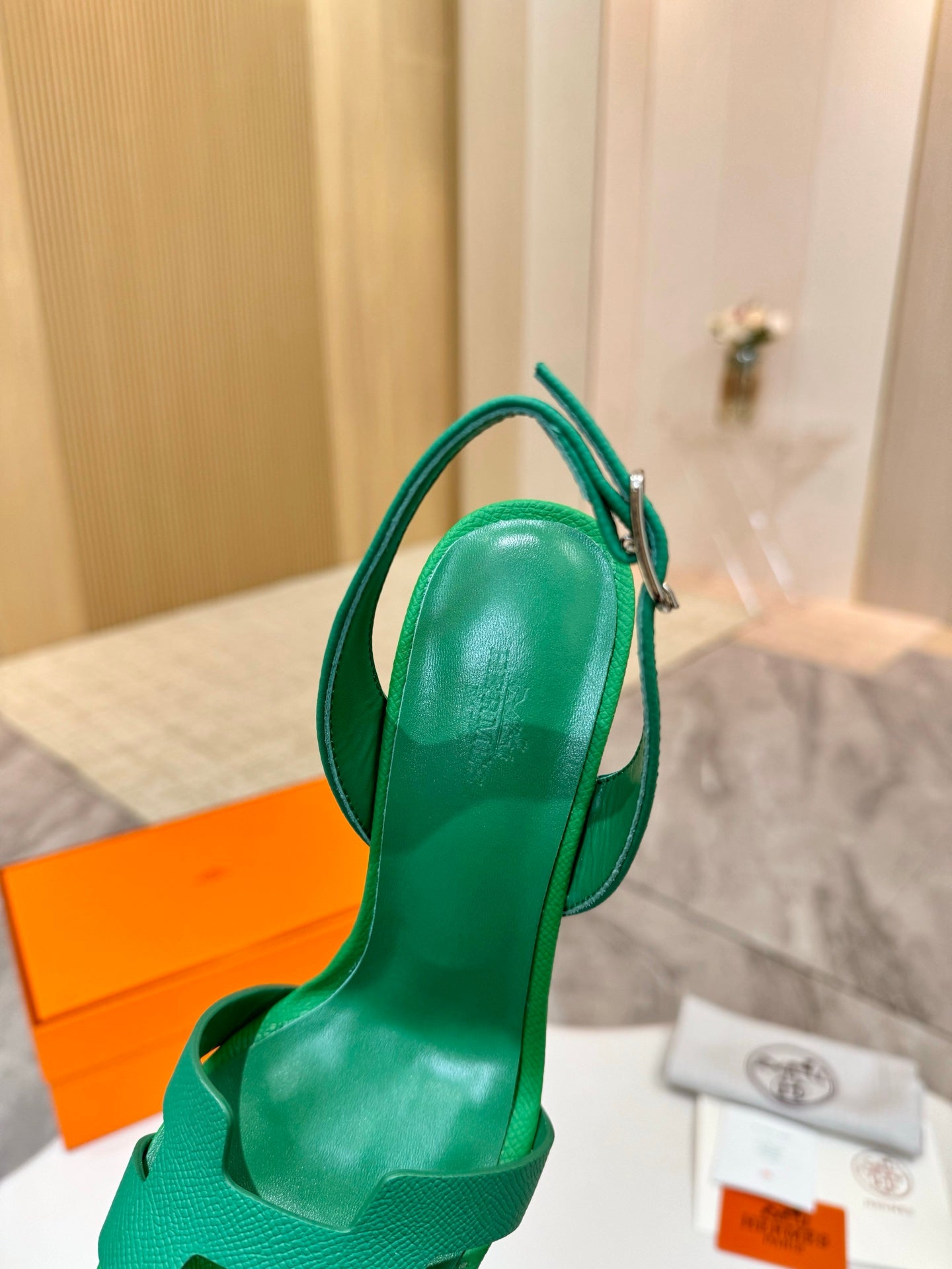 Hermes ladies green heeled sandals, back view with heel and slingback strap