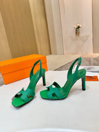 Hermes ladies green heeled sandals with open toe and slim ankle strap