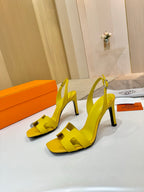 Hermes yellow leather heeled sandals with wide straps and square open toe