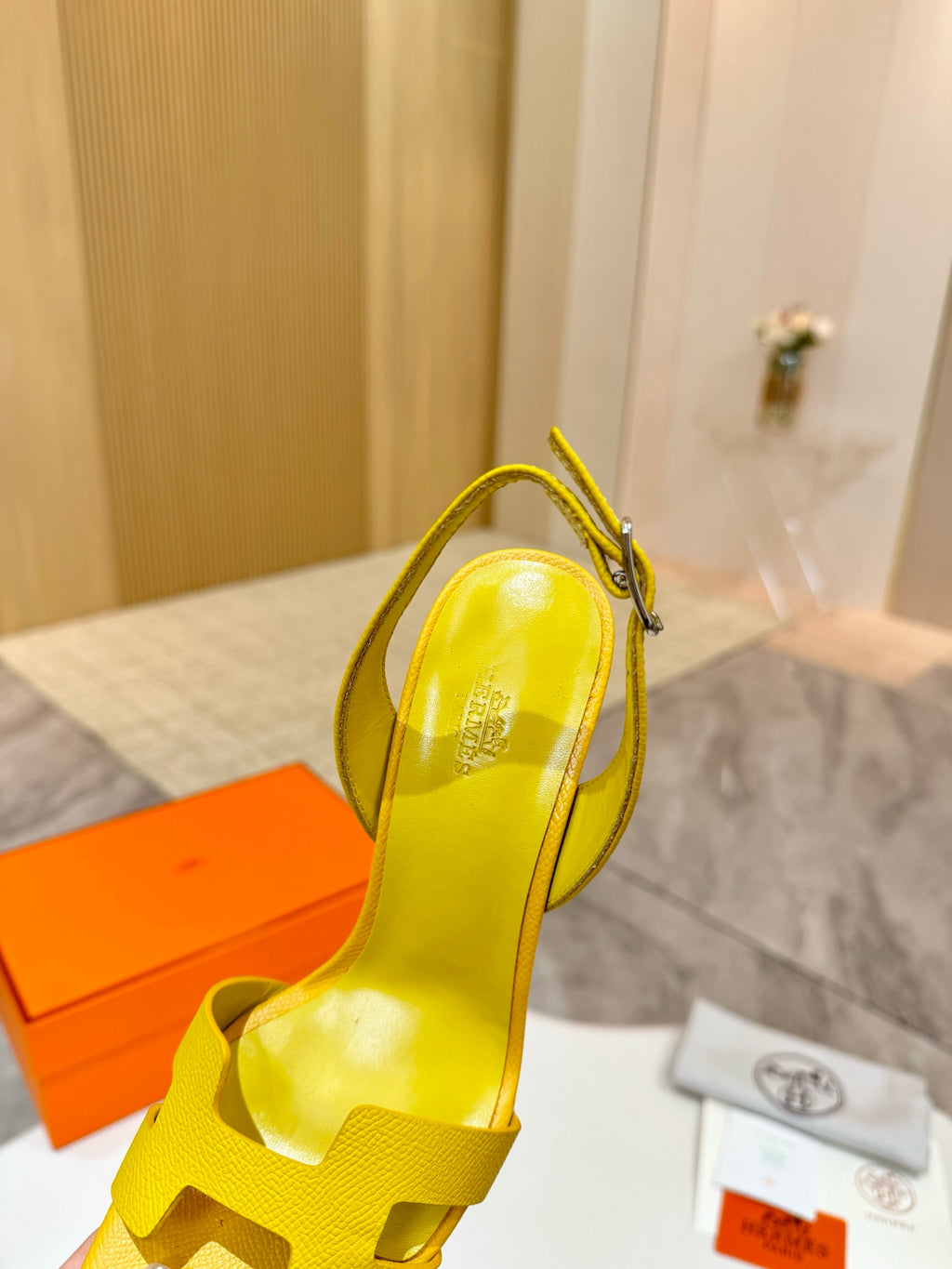 Hermes yellow leather slingback sandal with ankle strap and textured heel detail
