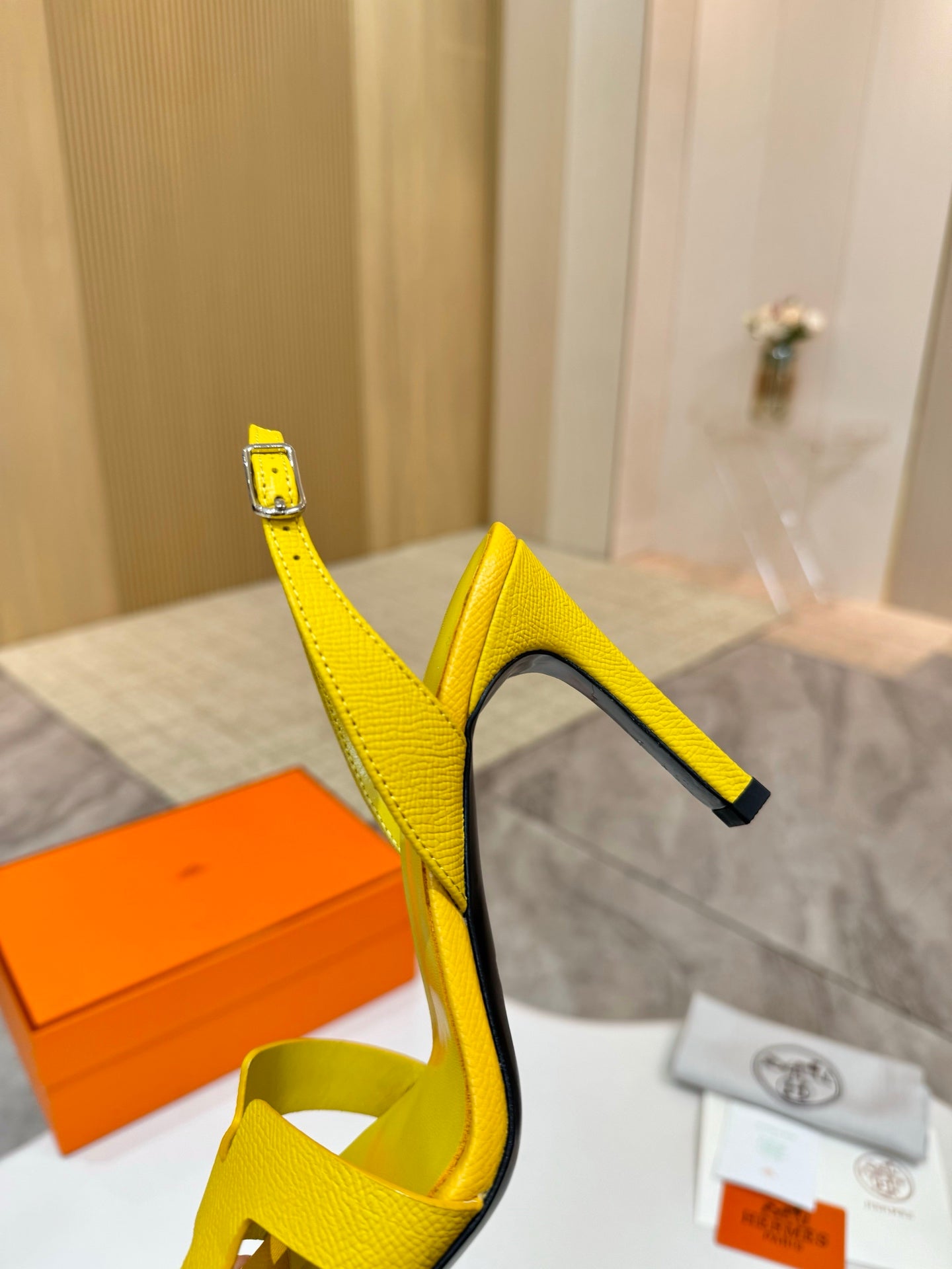 Hermes yellow leather heeled sandal with ankle strap and buckle strap detail