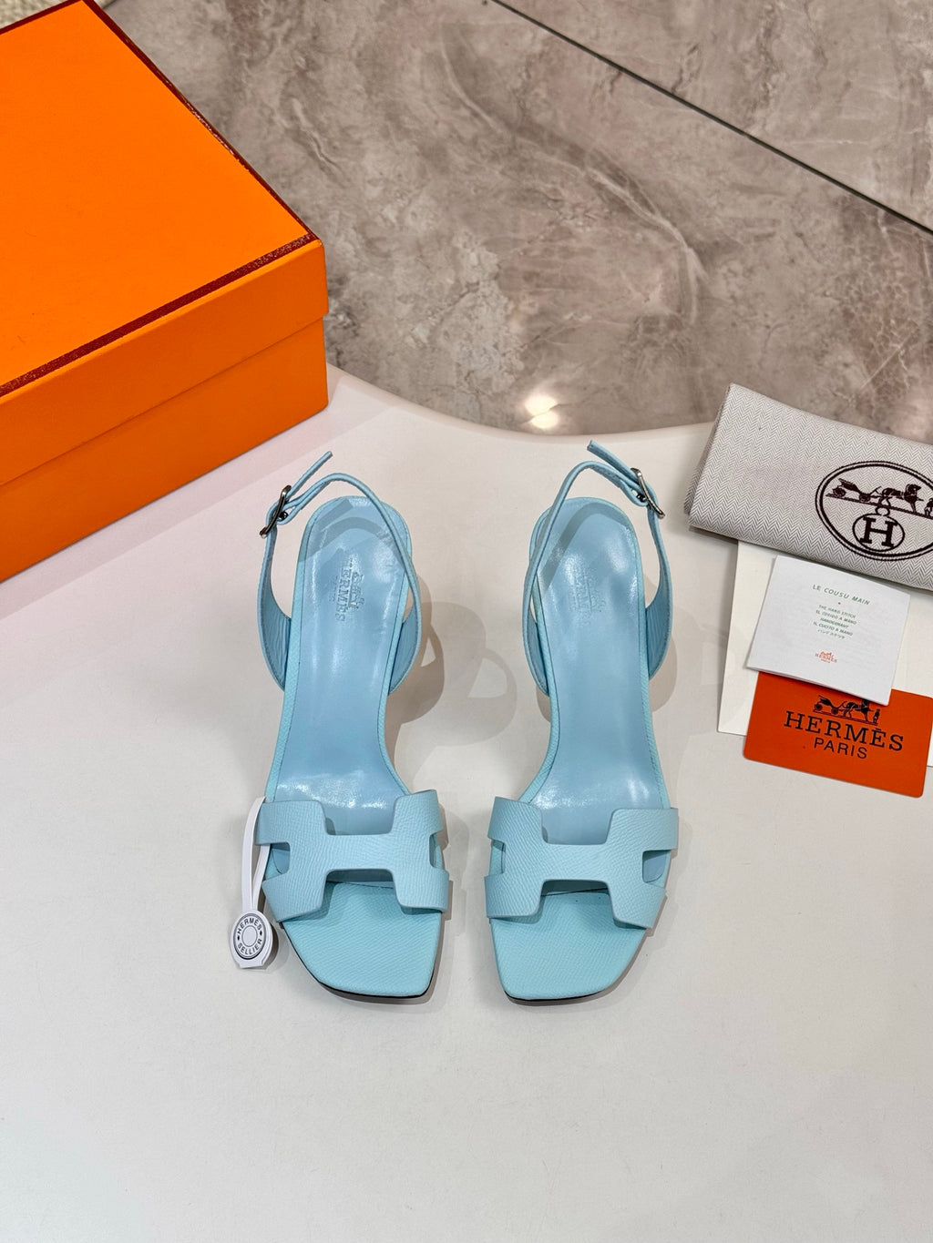 Hermes light blue heeled sandals with closed toe and adjustable buckle straps