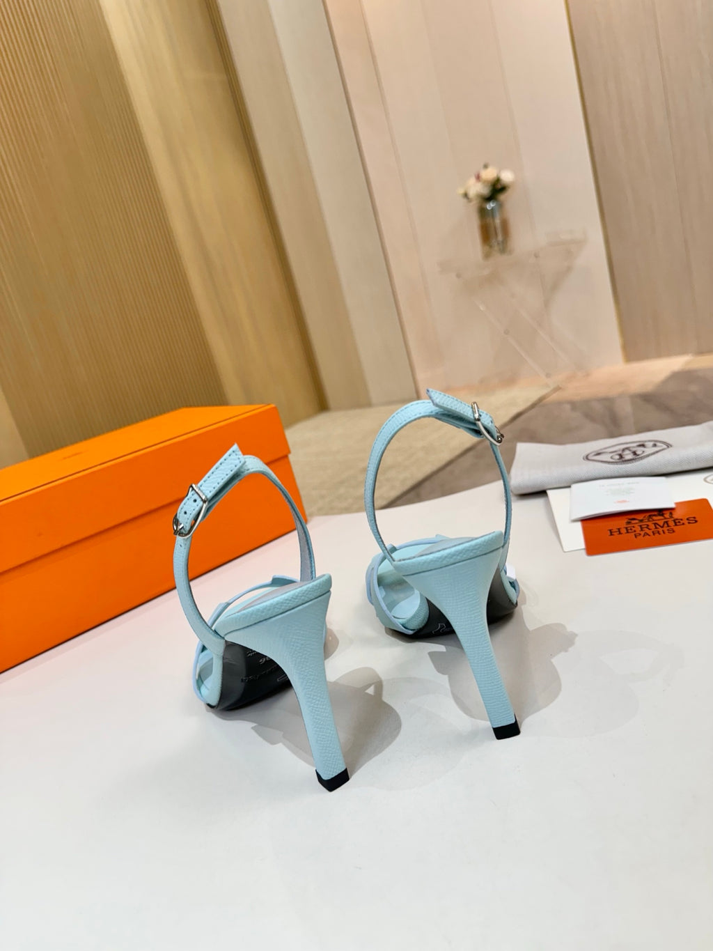 Hermes light blue slingback heeled sandals with open back and adjustable ankle strap