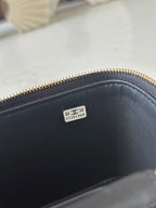 Black leather interior with Chanel logo stamp and small code label