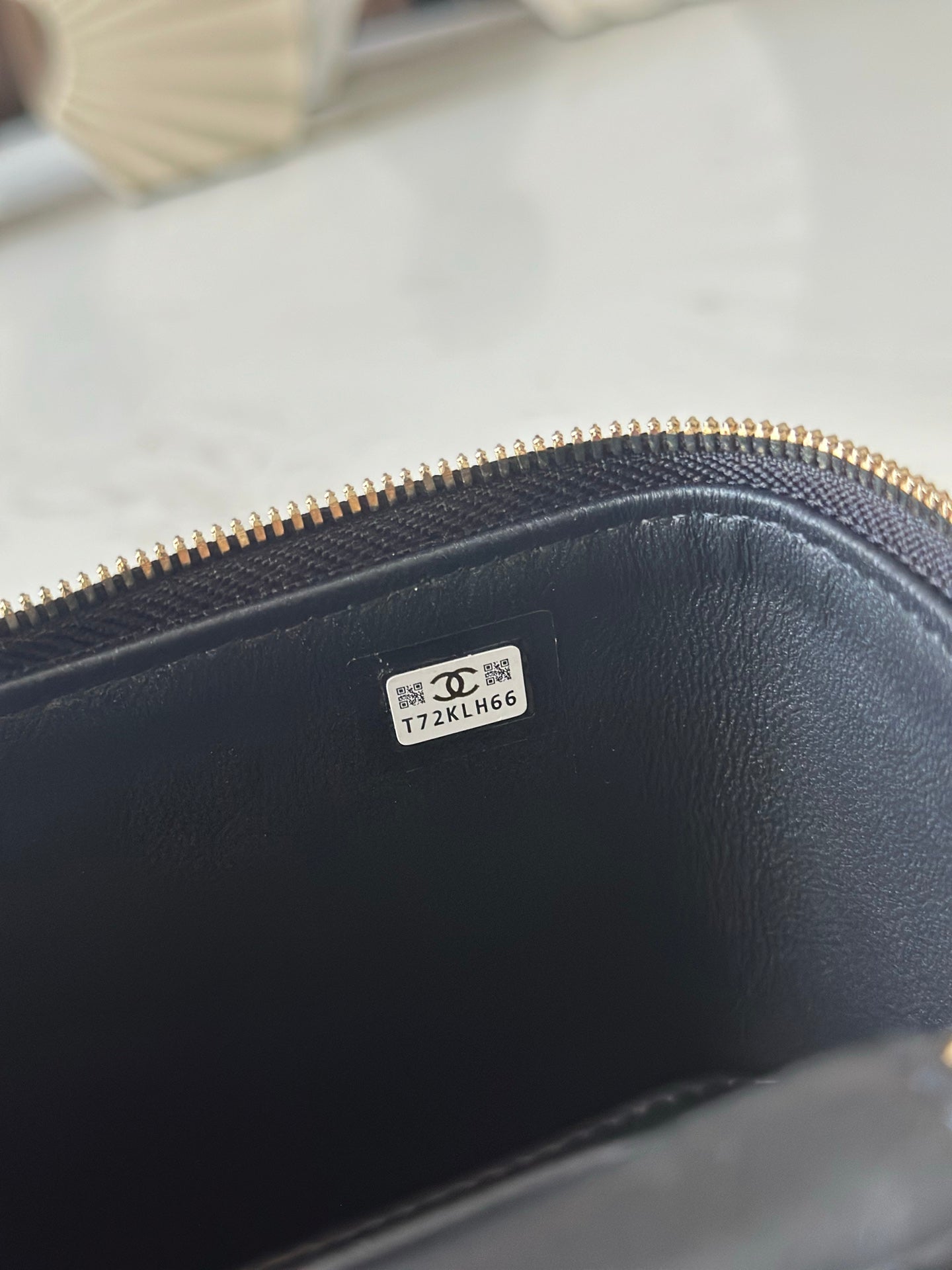Black leather interior with Chanel logo stamp and small code label