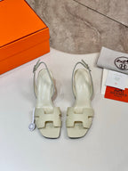 Hermes ladies slingback heels, cream uppers with adjustable buckle strap