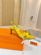 Hermes yellow leather slingback sandals with block heel and cutout straps