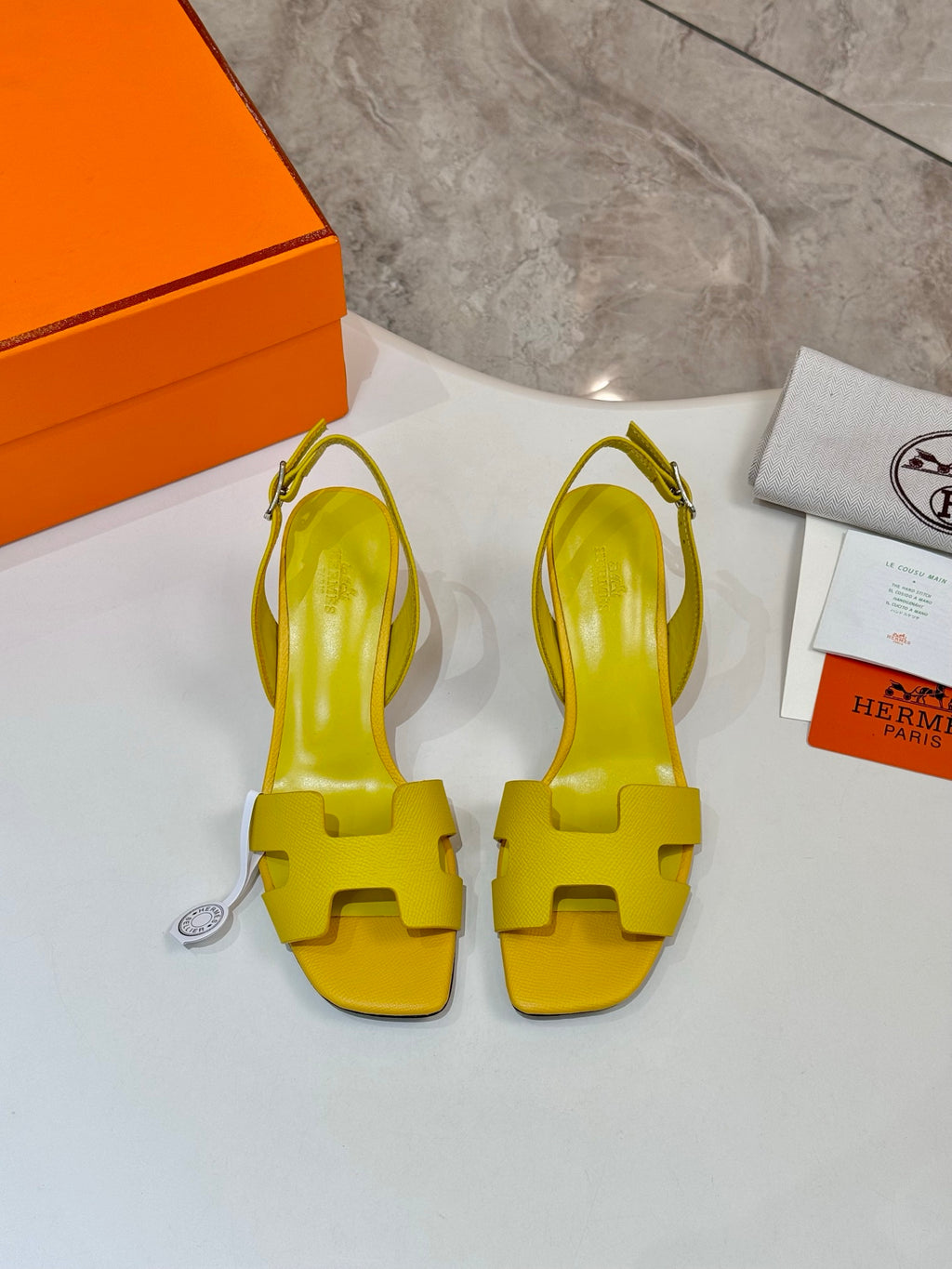 Hermes yellow leather slingback sandals pair view, open toe and block heels