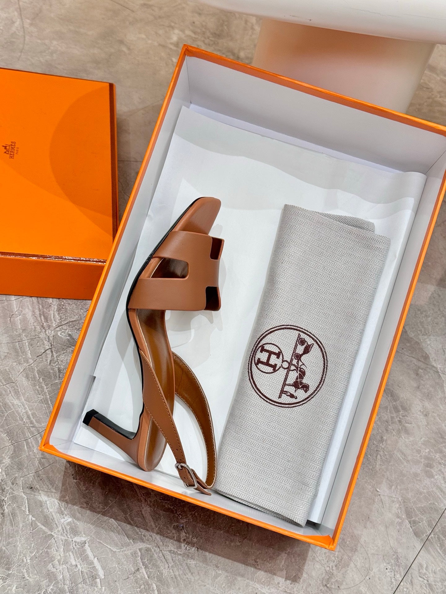 Hermes women's tan leather heeled sandals with T-strap, open toe, dust bag included