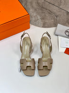 Hermes ladies heeled sandals in light beige with open toe and ankle strap