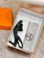 Hermes black heeled sandal and light gray dust bag in orange gift box set