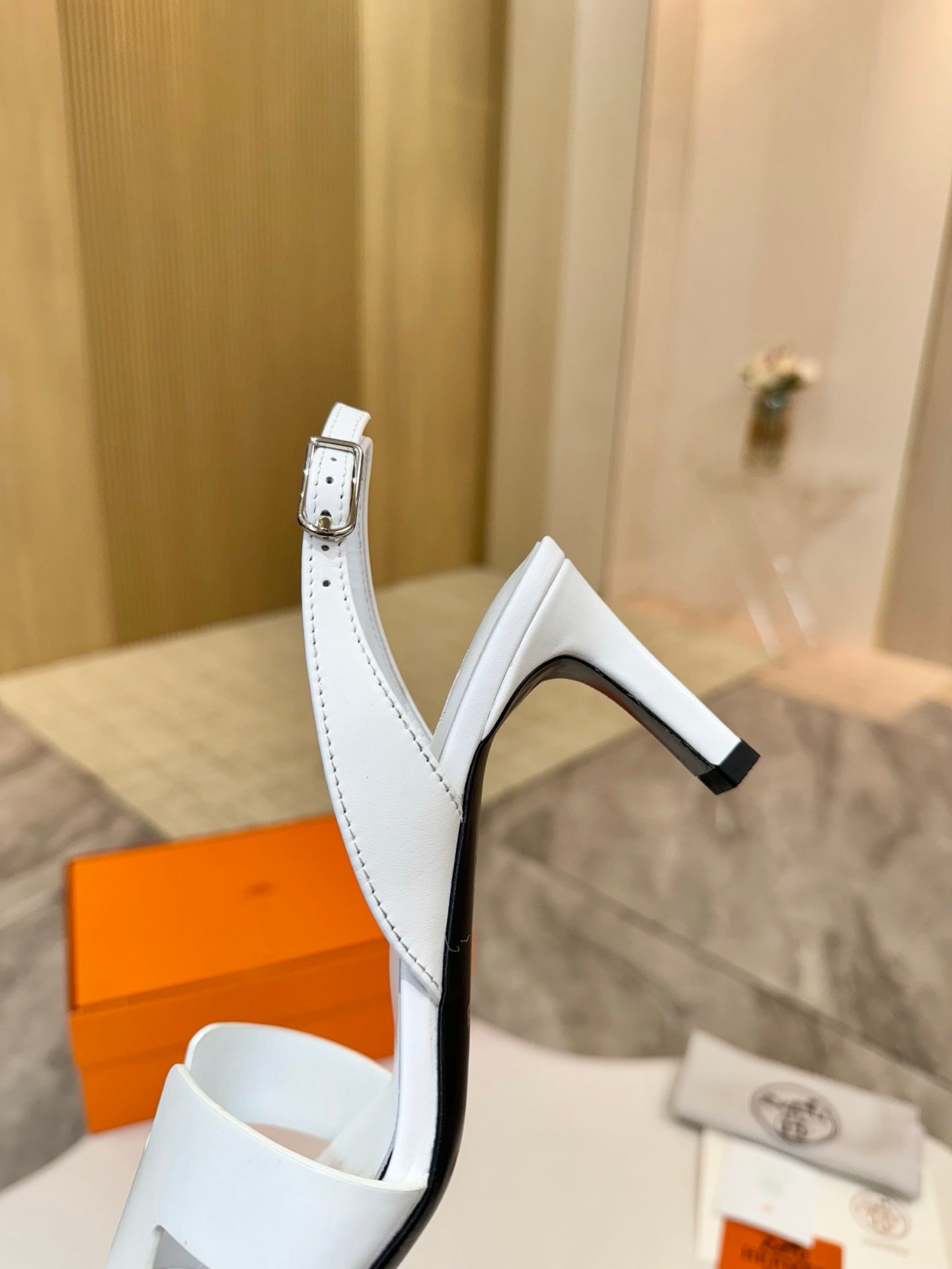 Hermes women's heeled sandal, white leather ankle strap and slim block heel