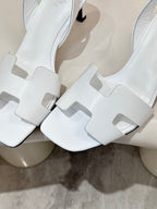 Hermes women's heeled sandal, white strap cutouts and block heel detail