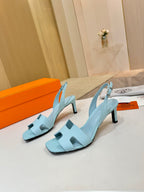 Hermes light blue slingback sandals with square heel and cutout strap detail