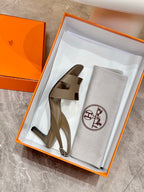 Hermes heeled sandals in gift box, taupe leather with cutout straps
