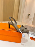 Hermes heeled sandals, taupe leather with cutout straps and ankle buckle