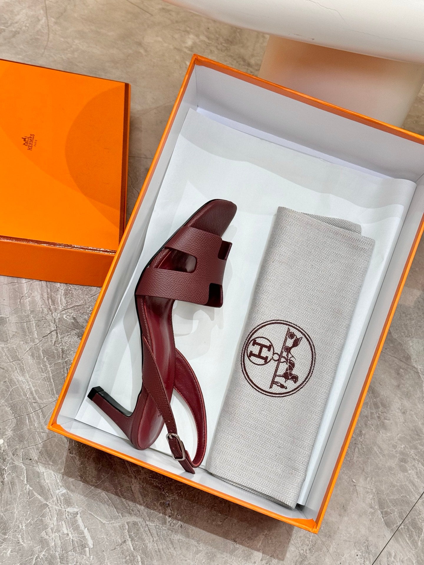Burgundy leather heeled sandals with T-strap and matching dust bag in gift box.