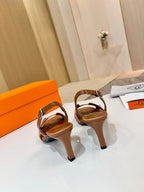Hermes ladies heeled sandals, tan leather open-toe with cutout straps, heel view