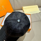 Black baseball cap crown with quilted grid texture and center snap button