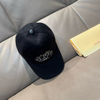 Black Louis Vuitton baseball cap with embroidered script logo and top button