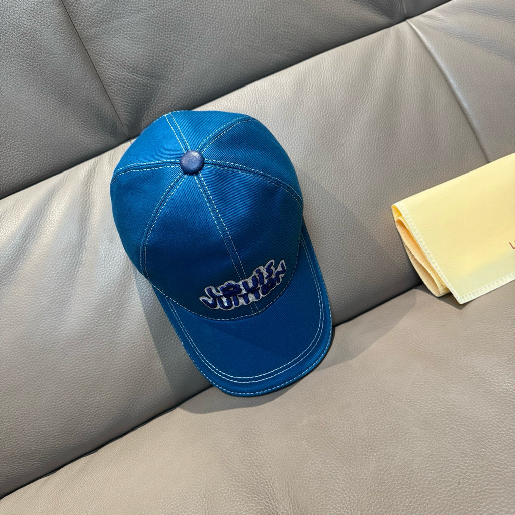 Blue denim cap with top button and embroidered Louis Vuitton logo on front panel
