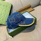 Gucci denim cap in blue with GG pattern and yellow-trimmed curved brim