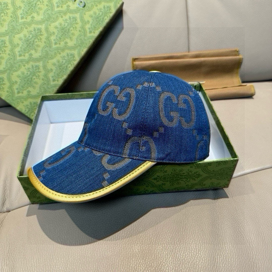 Gucci denim baseball cap in blue with GG pattern and yellow edge trim