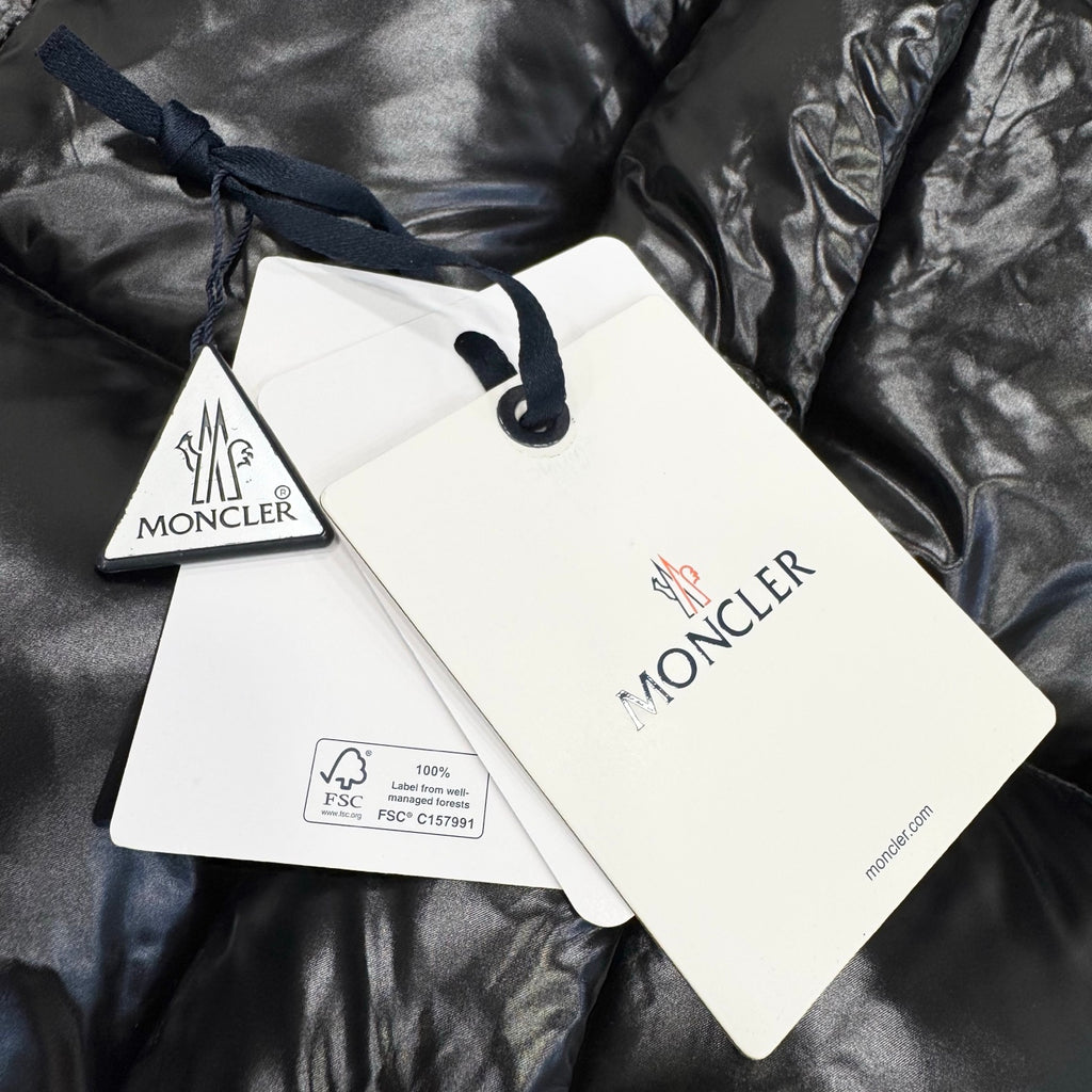Moncler long jacket, dark shiny fabric with hanging logo tags