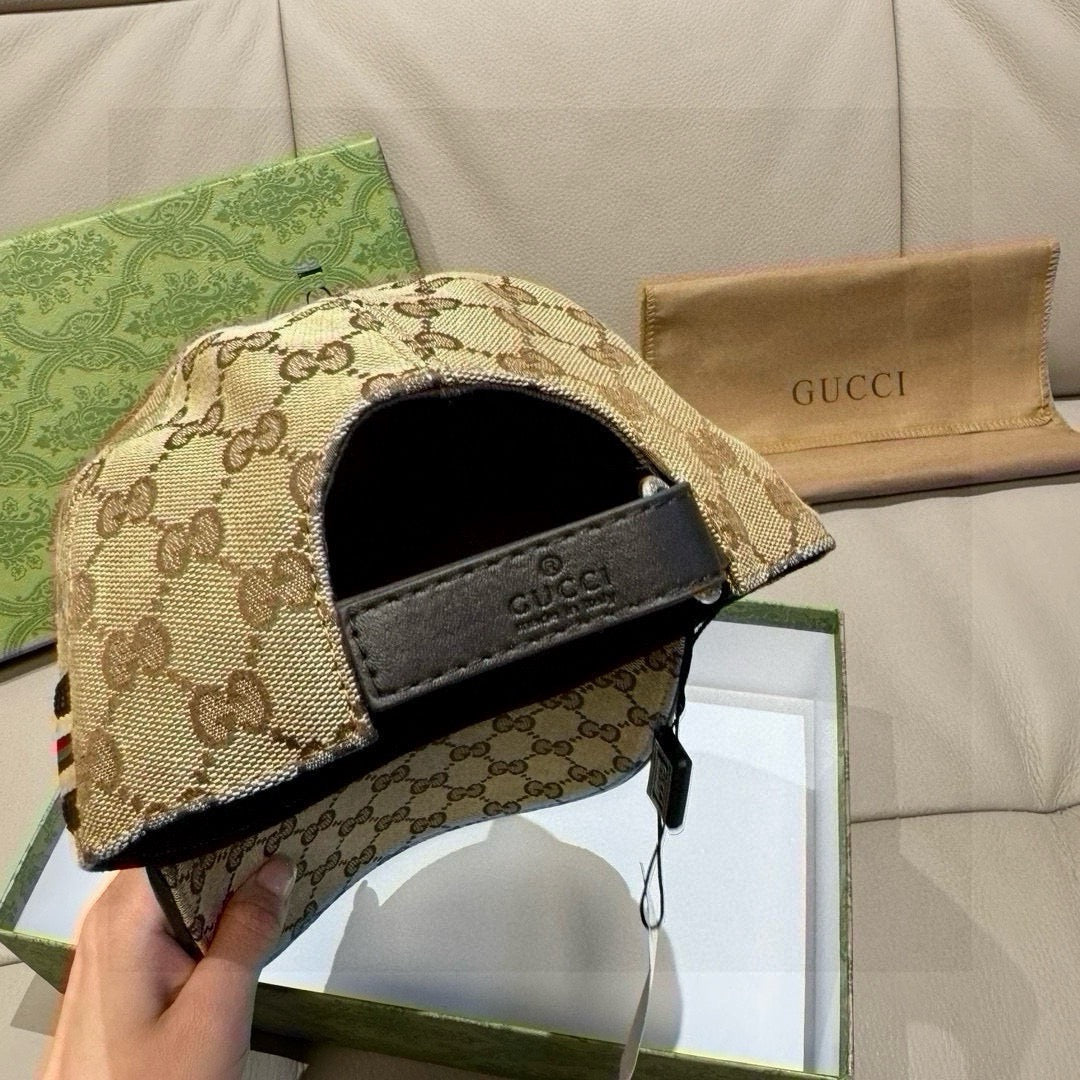 Gucci GG monogram cap with adjustable black strap buckle