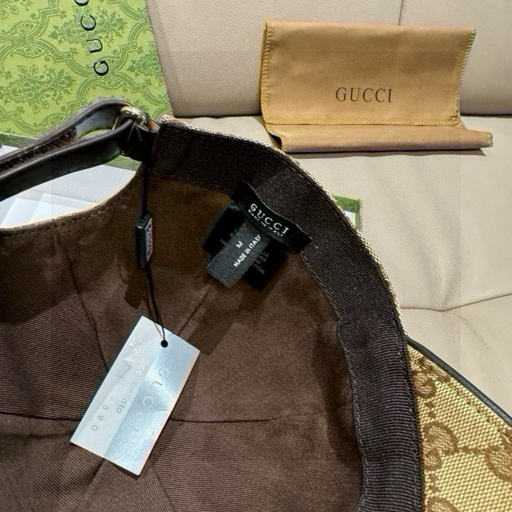 Gucci cap interior with black lining and branded hang tag