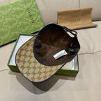 Gucci GG monogram cap interior with black underside and adjustable strap
