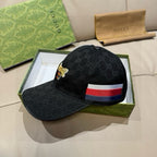 Black Gucci baseball cap with bee pin and multicolor stripe band
