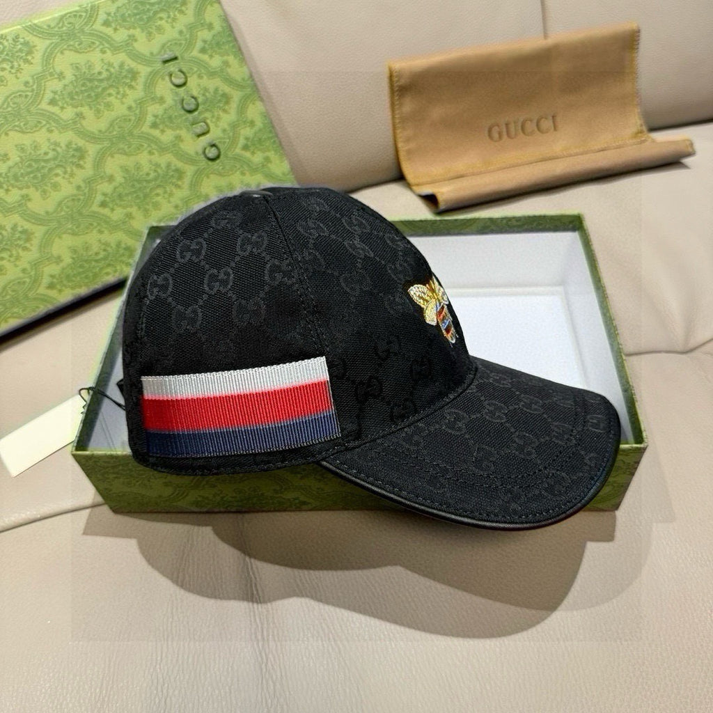 Black Gucci baseball cap with multicolor stripe band and curved brim