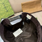 Gucci cap interior showing adjustable strap and inner label