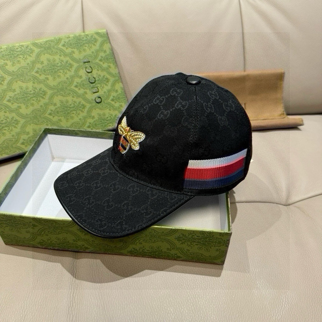 Black Gucci baseball cap with bee logo and multicolor stripe band