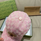 Pink baseball cap back view with monogram texture and round top button