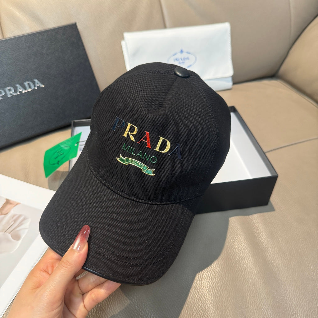Prada baseball cap, black with front Prada Milano logo patch.