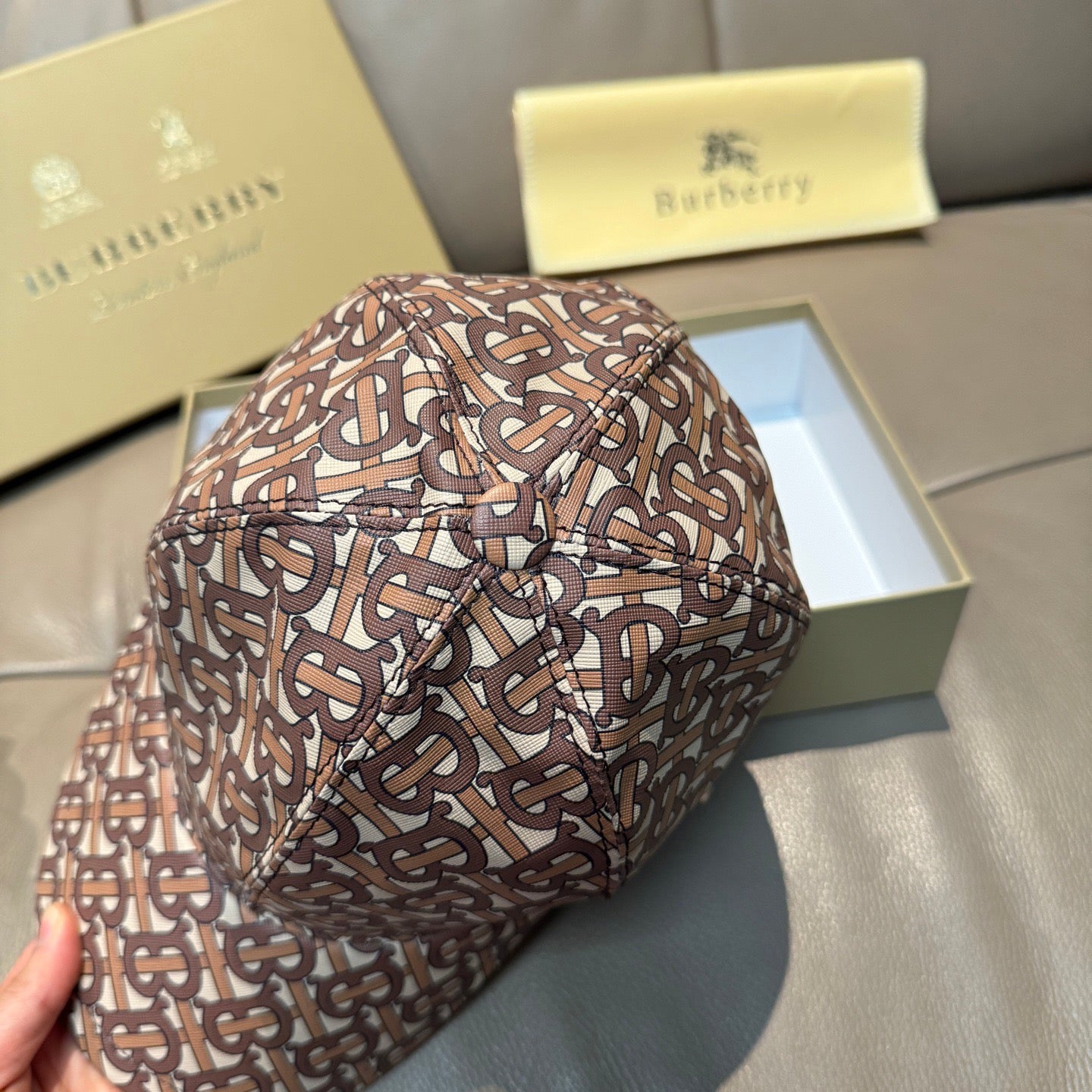 Burberry baseball cap with TB monogram print, close-up on crown