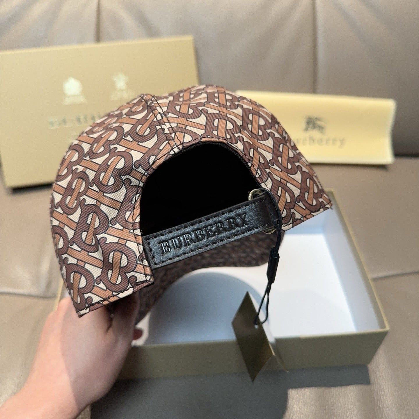 Burberry cap with TB monogram fabric and black adjustable strap