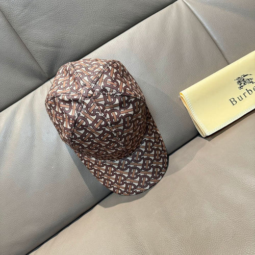 Burberry baseball cap in brown TB monogram, side view with curved brim