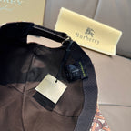 Burberry cap interior with black mesh lining, adjustable strap and tags
