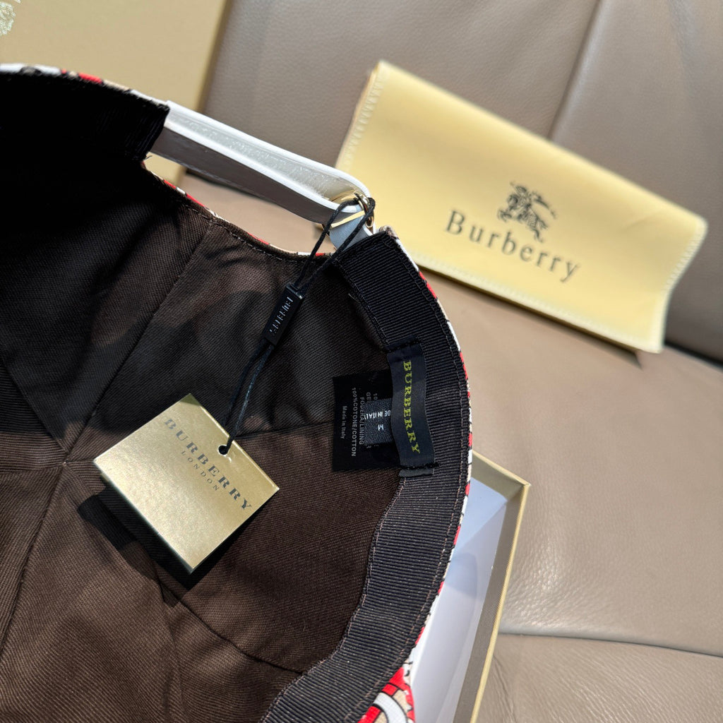 Baseball cap with patterned underside and black strap, interior label visible.